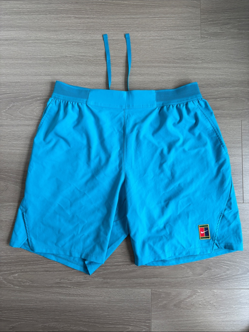 Nike Turquoise Tennis Shorts. Size Large.